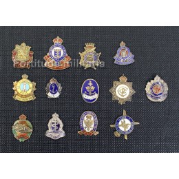 Silver enameled Canadian insignias